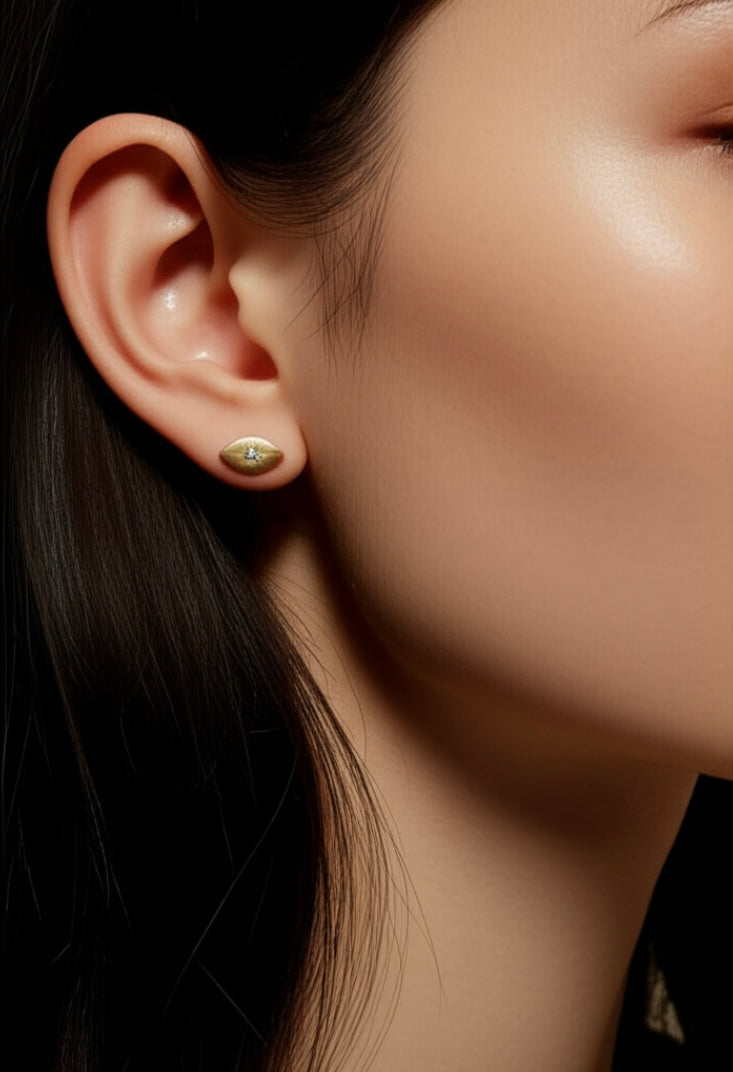 Sparkling Eye Sterling Silver Studs in Gold