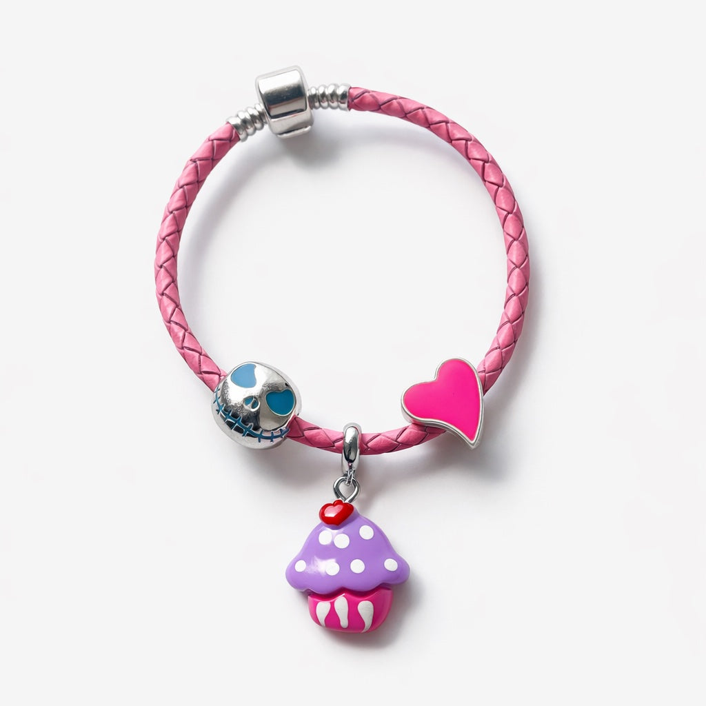 Pink braided bracelet with colorful charms on a white background