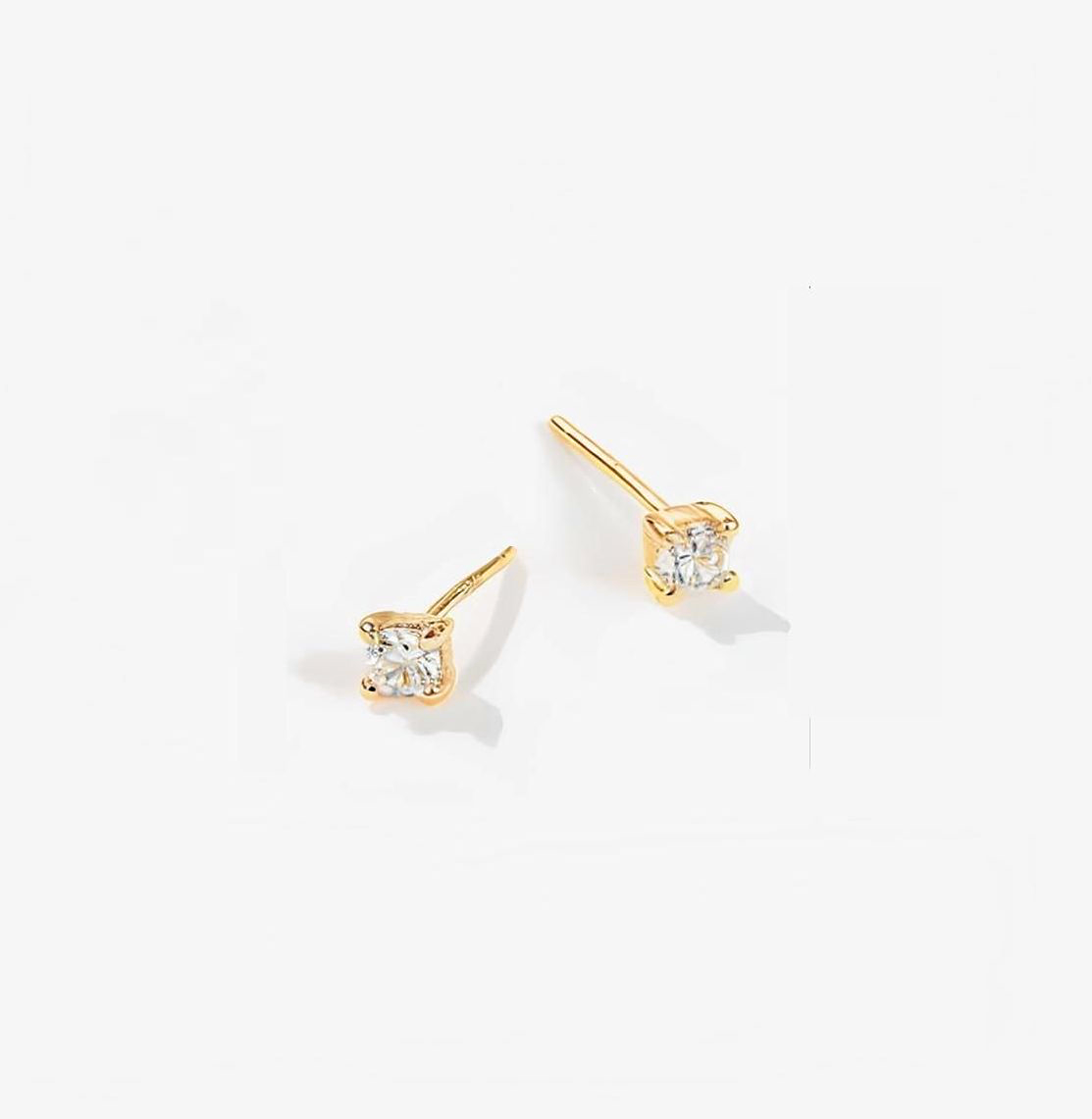 Delicate Four Prong Cubic Zirconia Studs in Gold