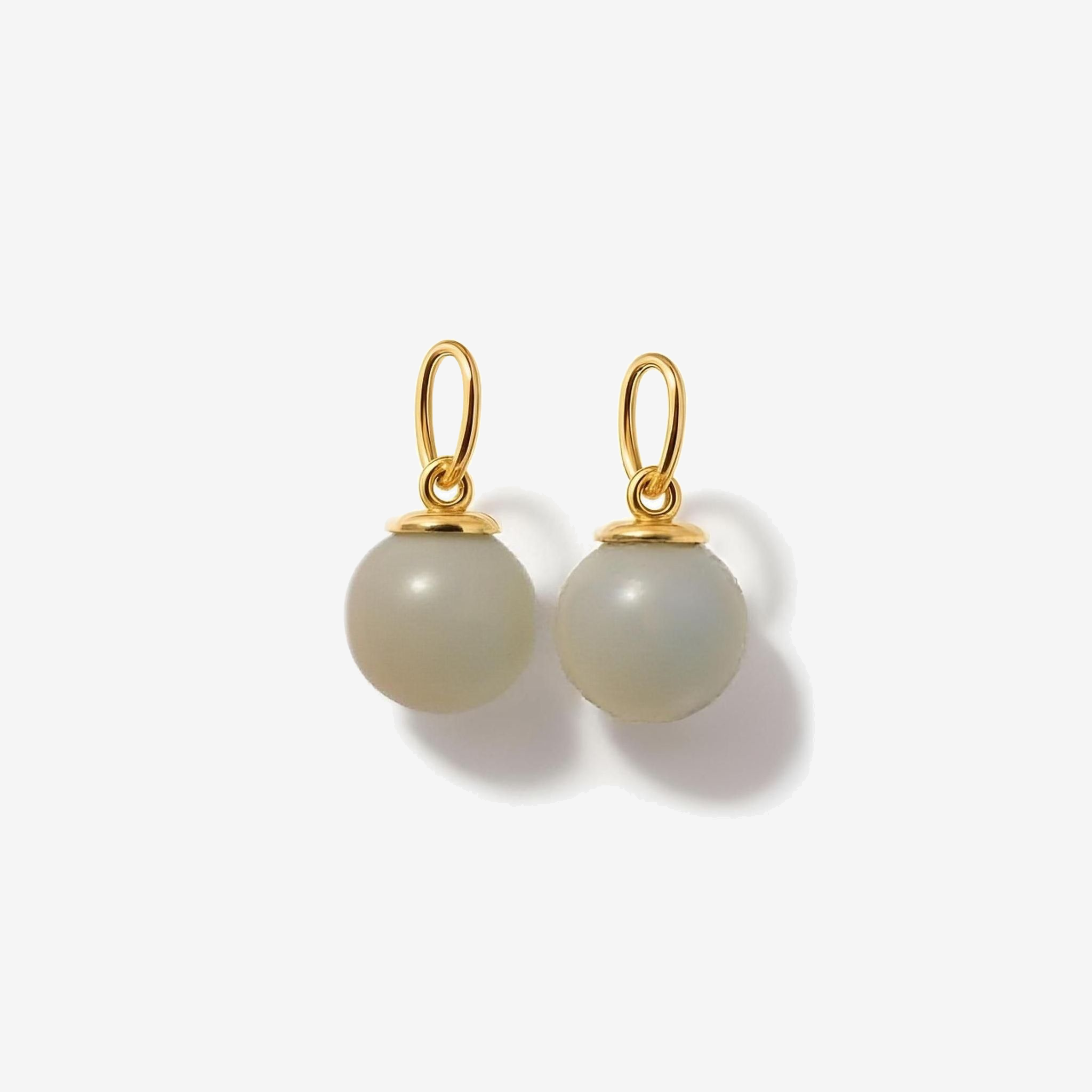 Pair of charms for earrings with gold jump rings and round light gray beads 