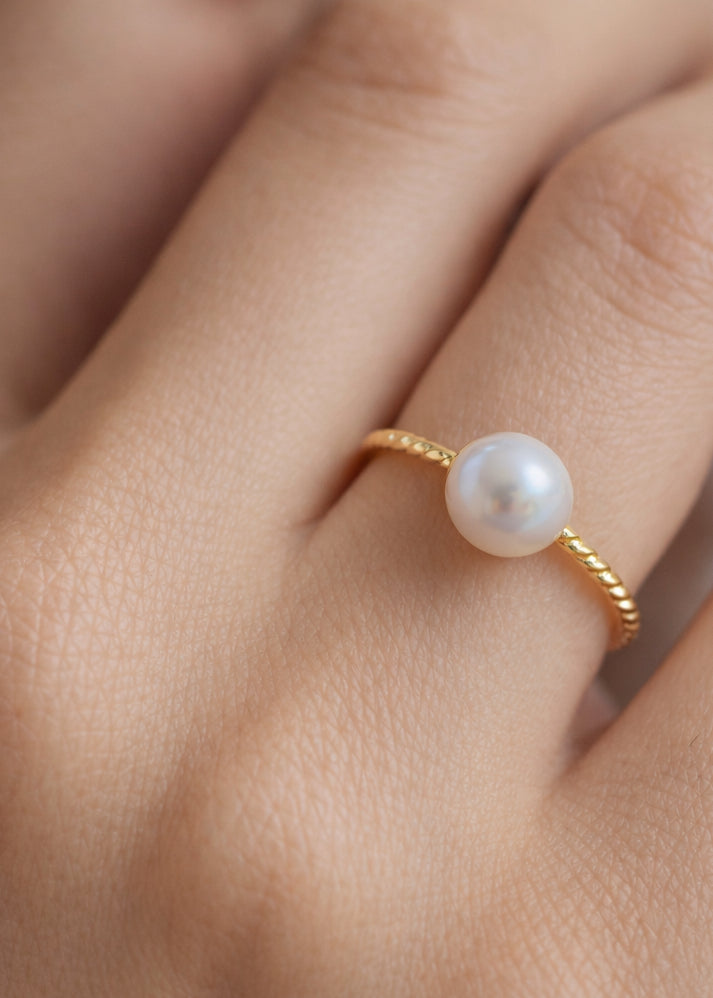 Twisted Golden Ring with Pearl