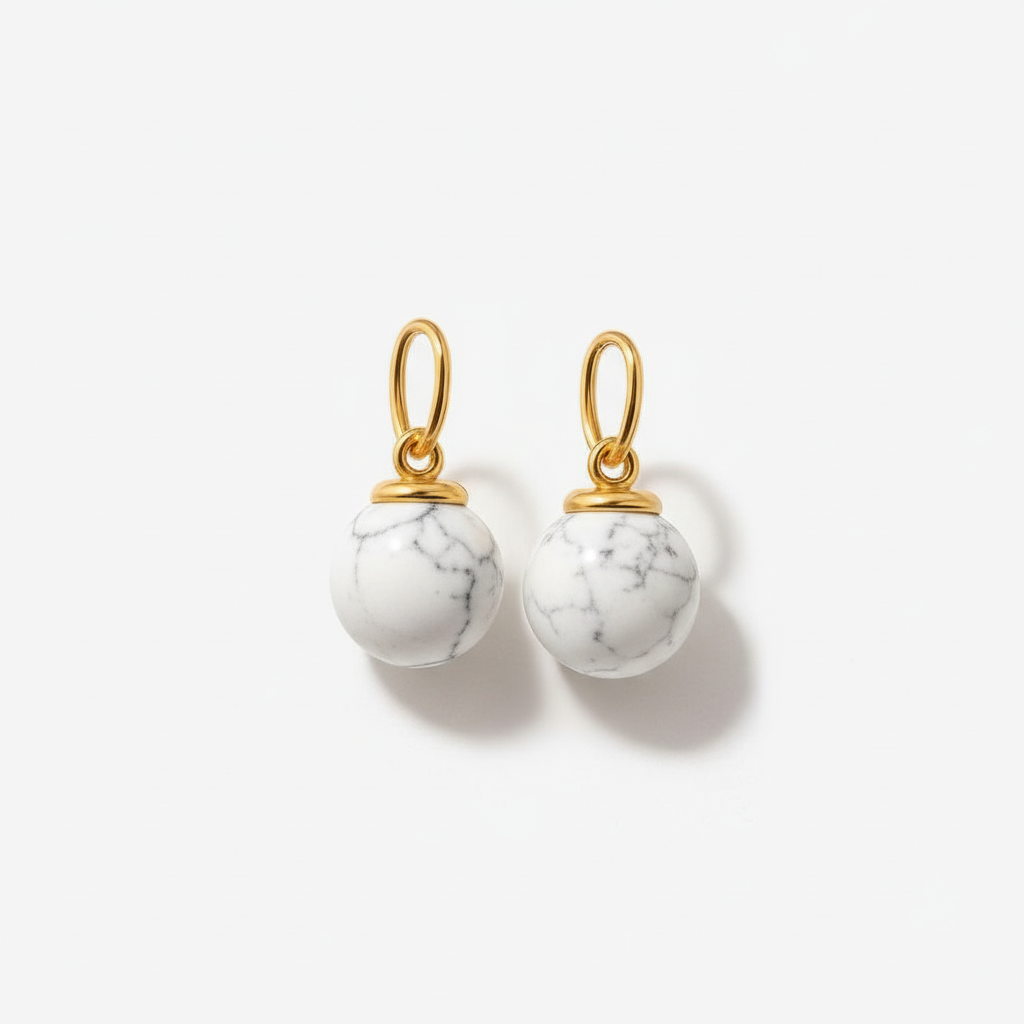 Pair of earring drop charms with gold jump and white marble-style beads