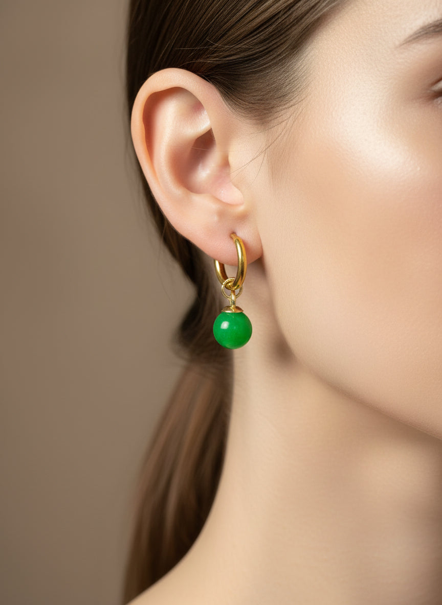 Gold hoop earrings with dangle charm 