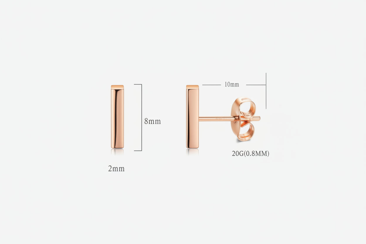 Rose gold earring on a white background