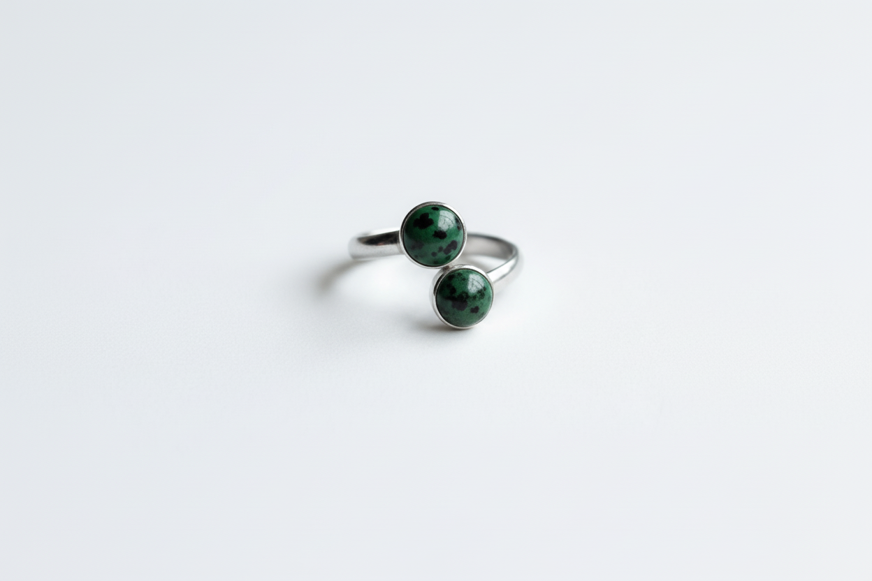 Stainless steel adjustable ring with two unakite stones
