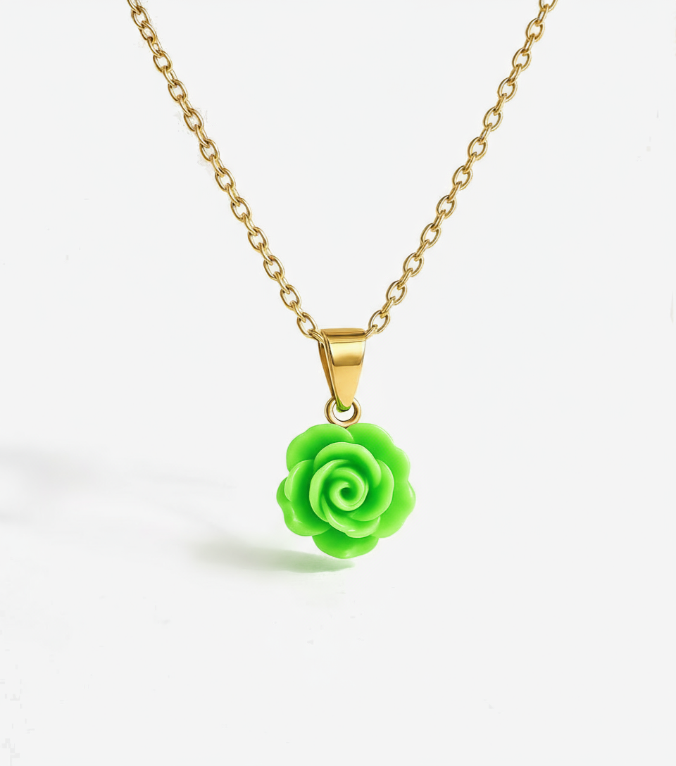 Necklace with a green rose pendant on a white background